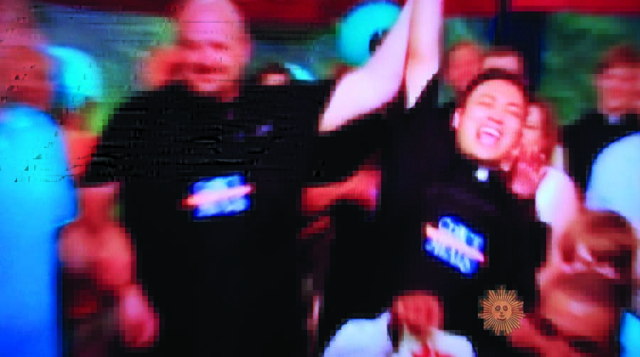 Two men celebrating