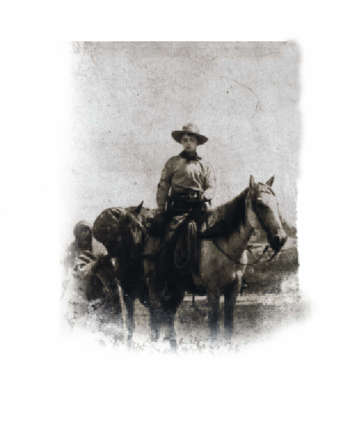 black and white of boy riding pony