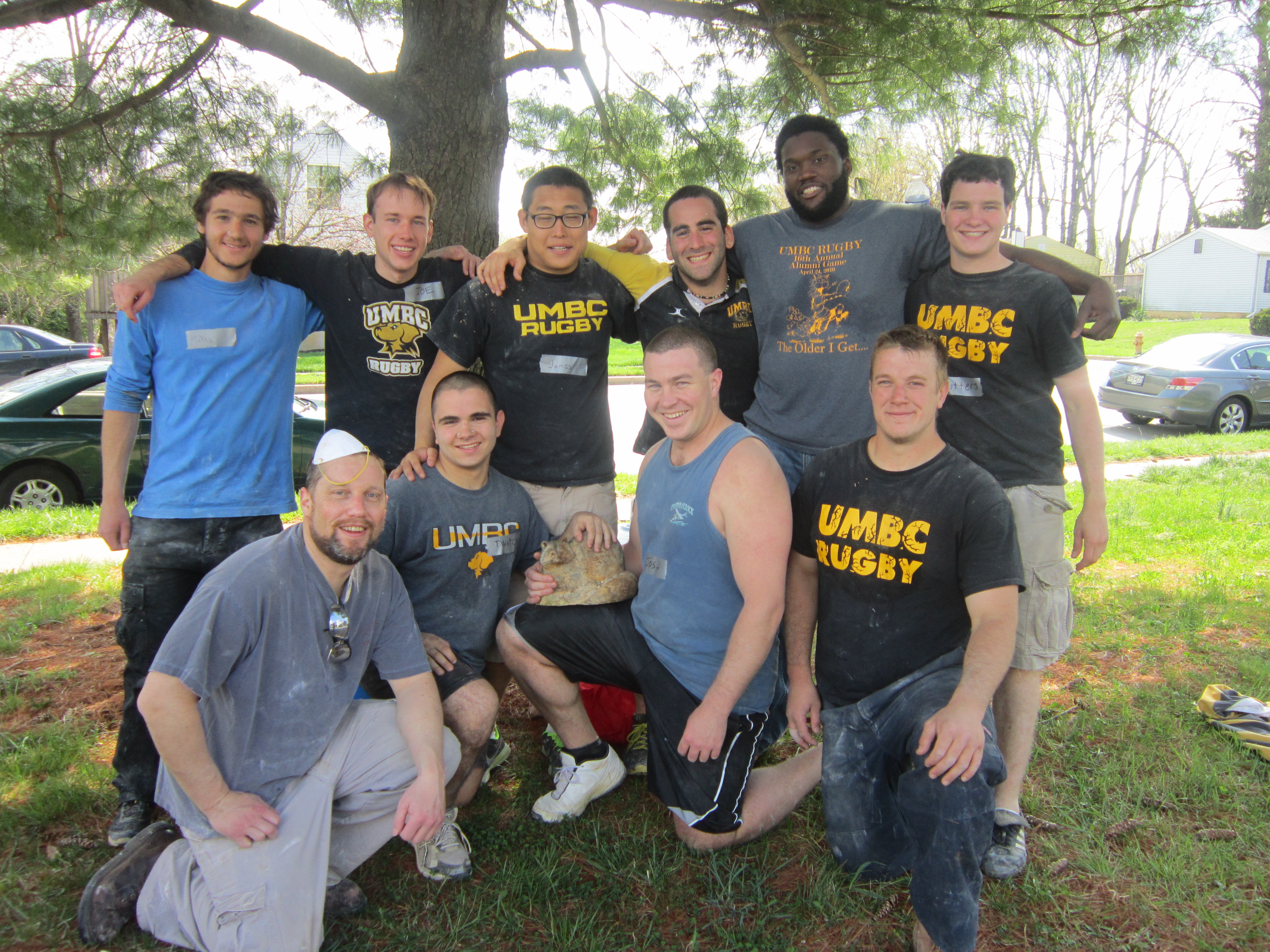 Habitat Chesapeake: Back Row L-R: Mikhail Hershfield, Joe Bieberich '12, James Park, Arya Koolaee, Tracy Williams '06, Phillip Zwaig. Front Row: Andrew Gaither '94, James Nardei, Josh Herring '08,'11, Ricky Raccoon, Erik Anderson