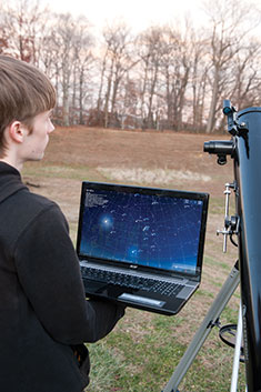 Student with telescope