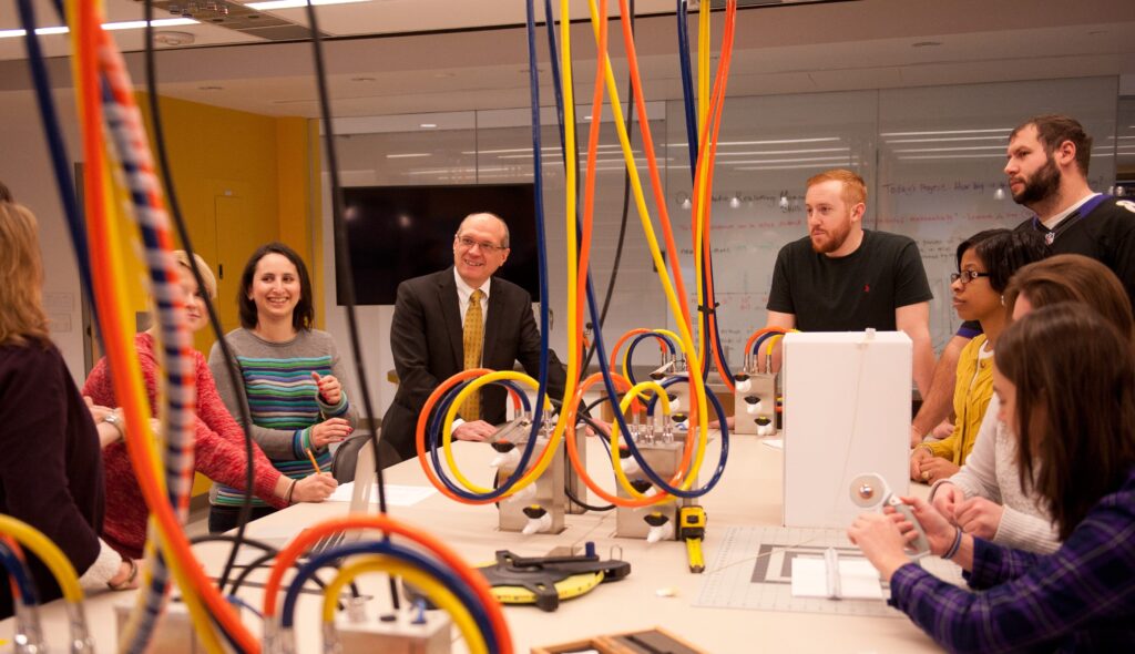 CNMS Dean LaCourse with students in UMBC's Science Learning Collaboratory