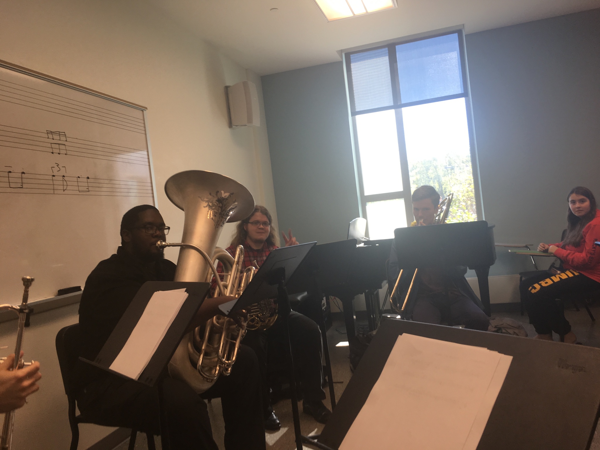 Kids practicing instruments in PAHB practice room