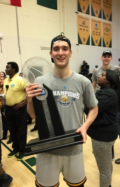 Joe Sherburne holding the America East trophy after defeating University of Vermont, 65-62, to cinch the 2017-2018 America East title; photo courtesy of Joe Sherburne. 