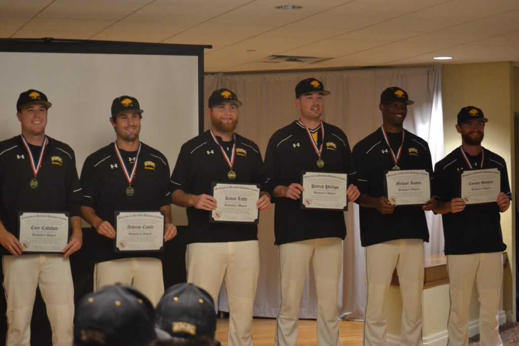 UMBC Baseball team honors graduating seniors on the road. Photo courtesy of UMBC Athletics.
