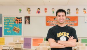 UMBC alumnus Sean Pang in his classroom