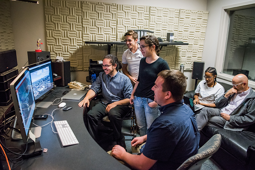 Members of the Race and Social Justice CoLab group work on pulling their research together.