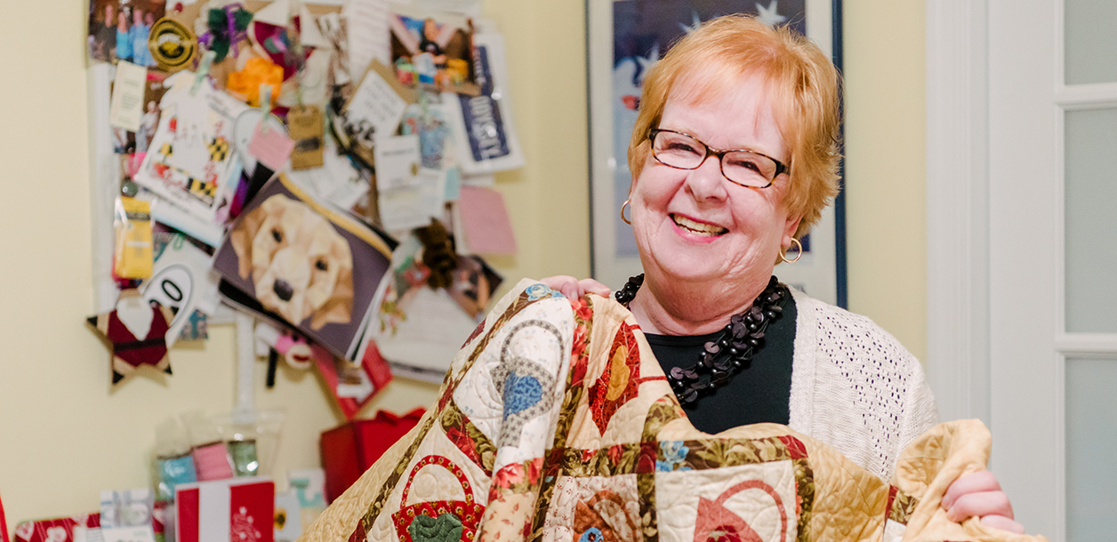 Mimi Dietrich '70 sewing