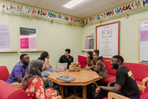 Students gather to celebrate The Mosaic's 15th anniversary in February 2019.