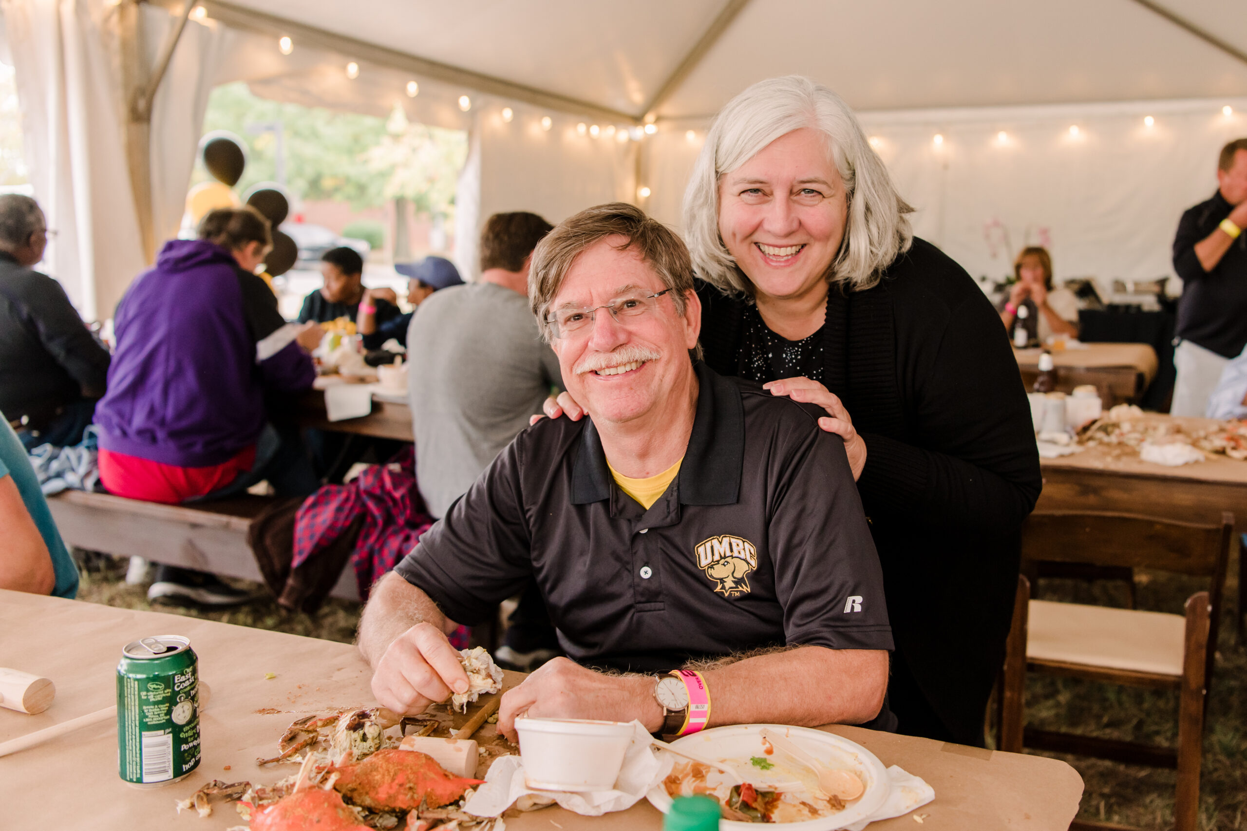 people smile at crab feast