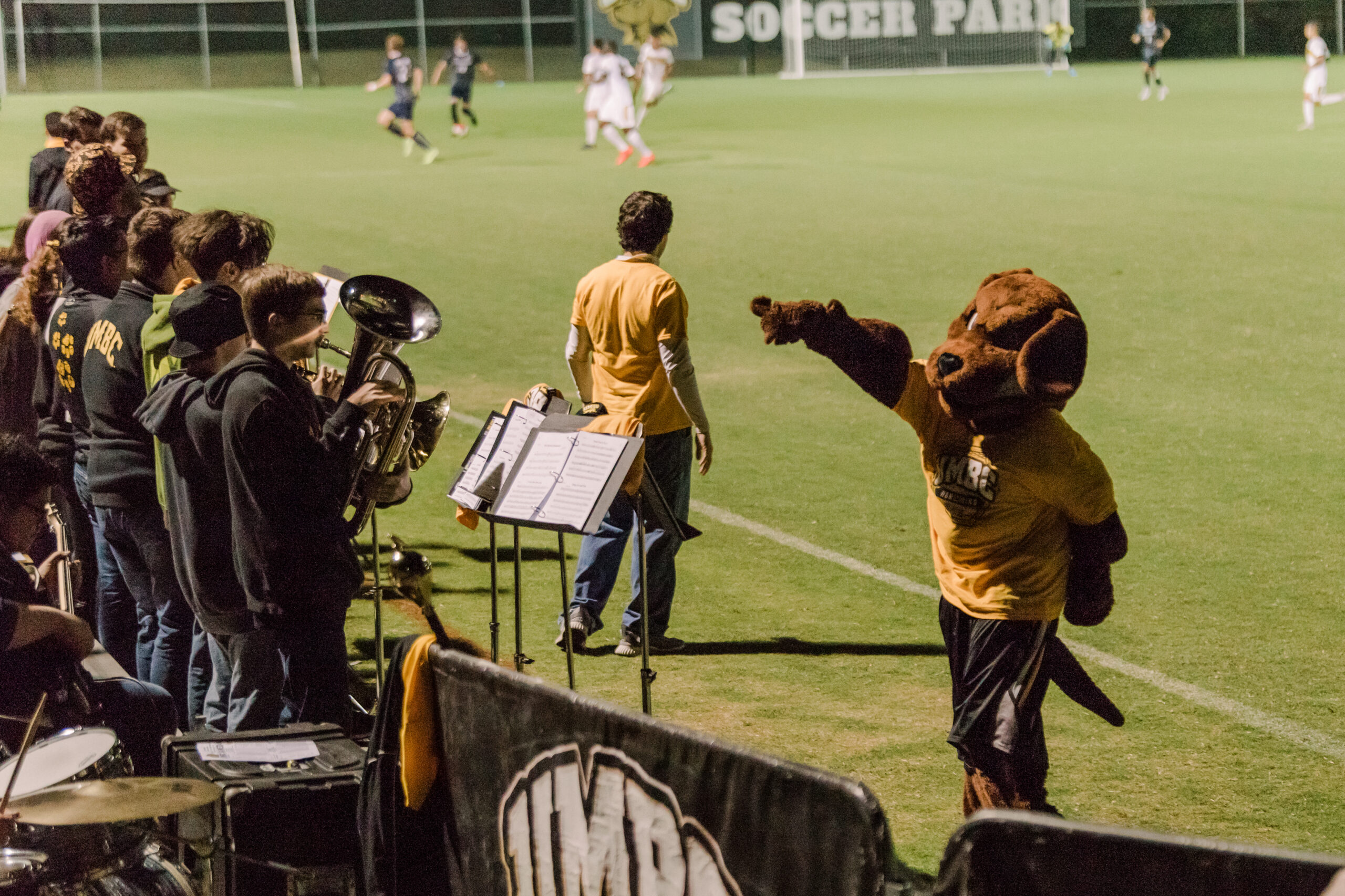True Grit conducts band at soccer game