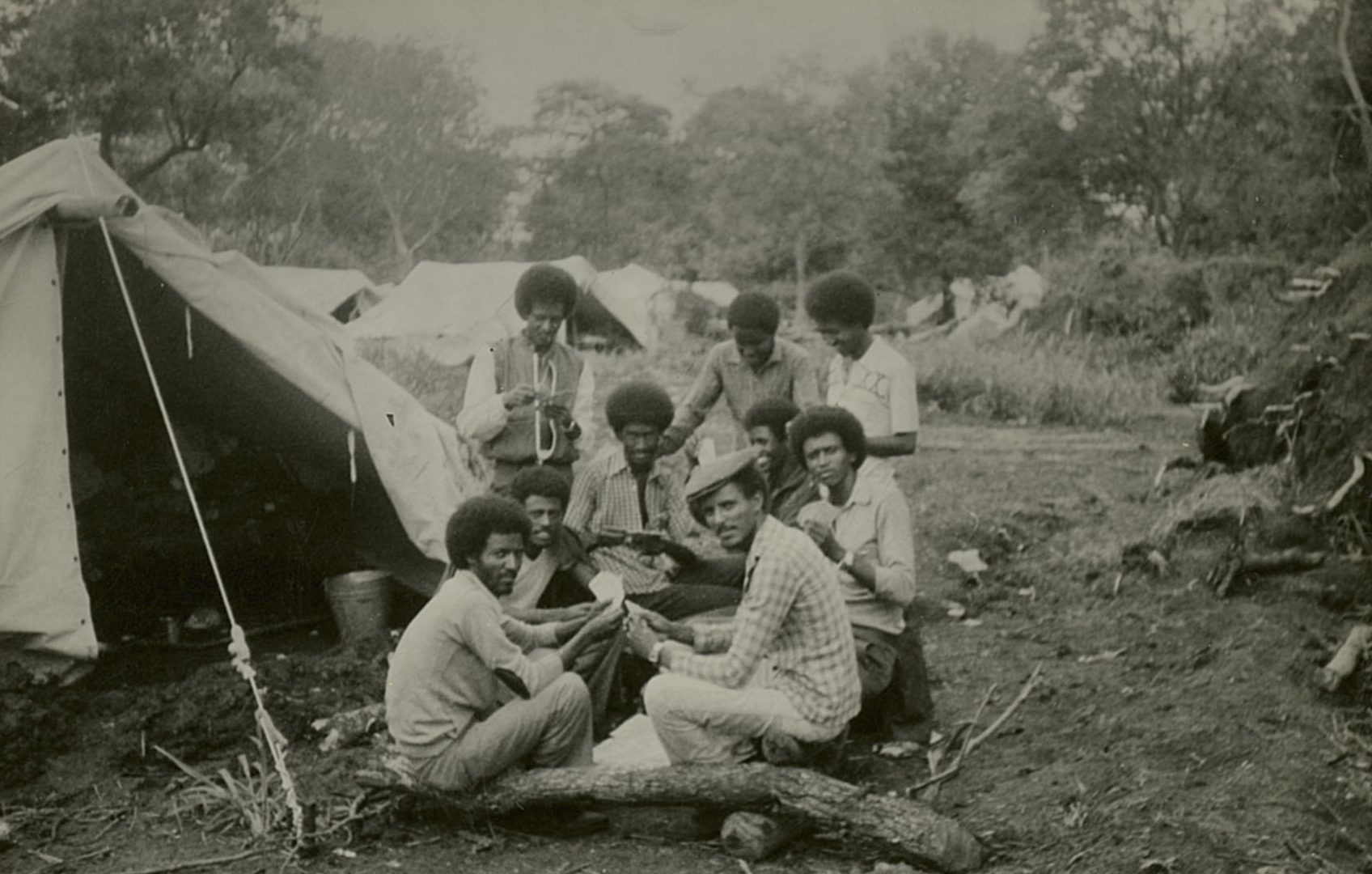 Black and white photo of black people camping