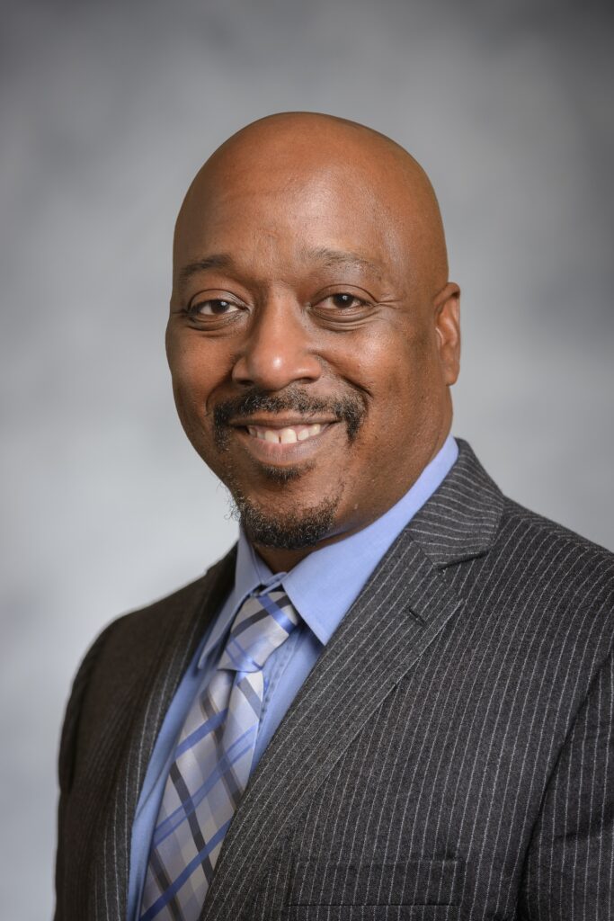 A headshot of Carl Fowlkes