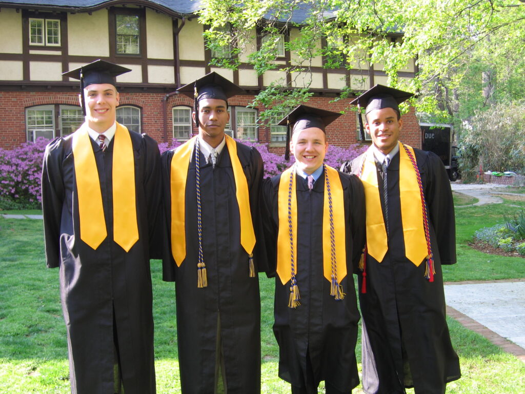Kinde, second from left, with his roommates Andy Windsor, Seth Miller, and Kenneth Gibbs, all fellow Meyerhoff Scholars, at a graduation celebration in 2005. Photo courtesy of Kinde.