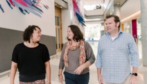 three people walking