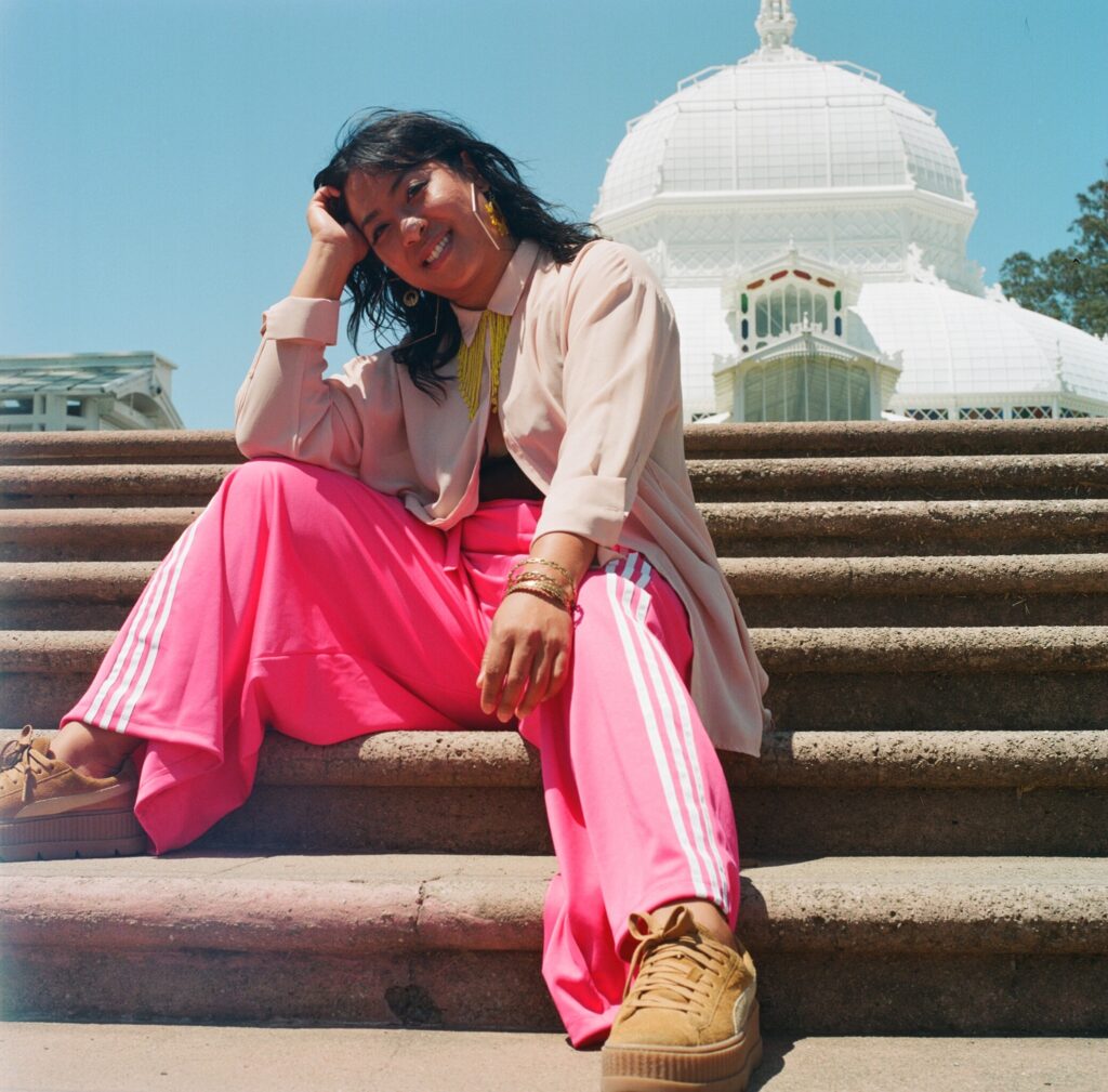 Kim Arteche poses on the steps