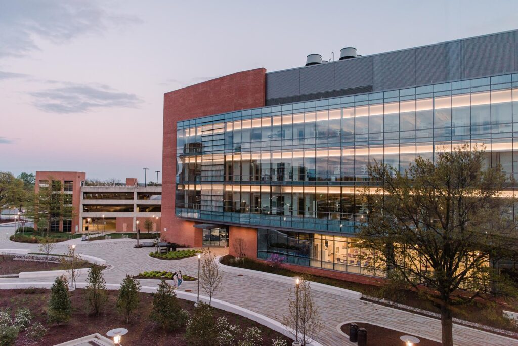 View of a glass building on campus during the Spring.