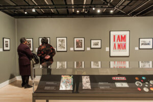 people look at a museum exhibit