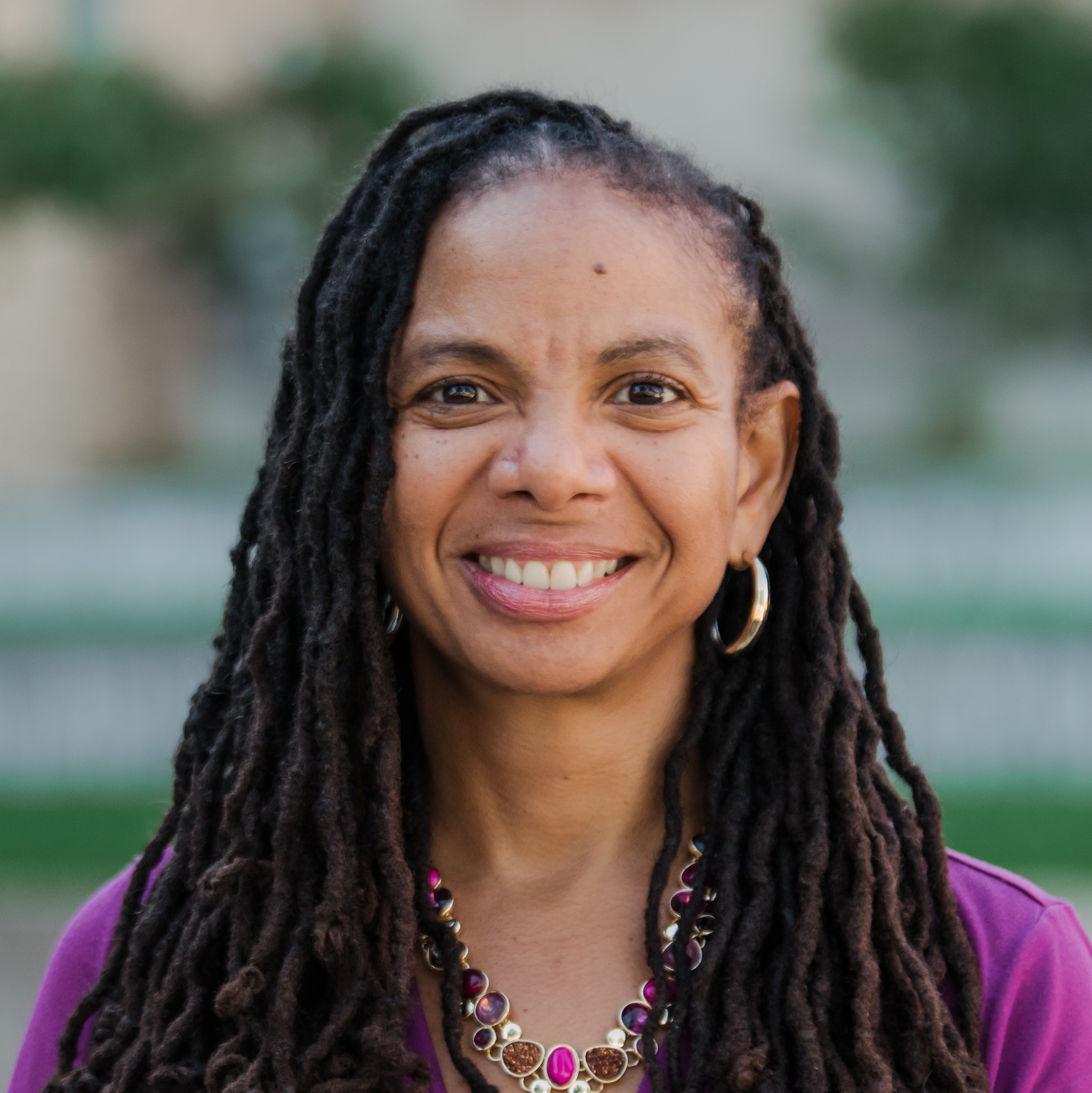 Portrait of smiling woman in professional attire