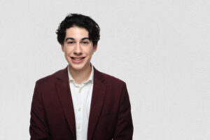 Portrait of student on subtle gray textured background