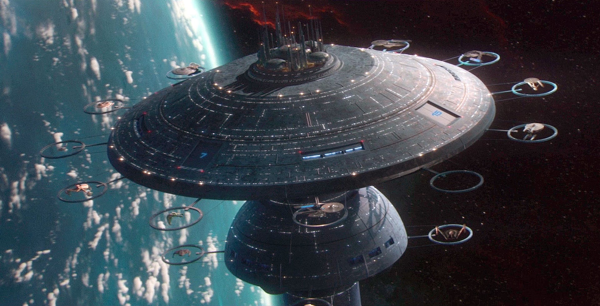 A Star Trek spacecraft seen orbiting above the Earth.