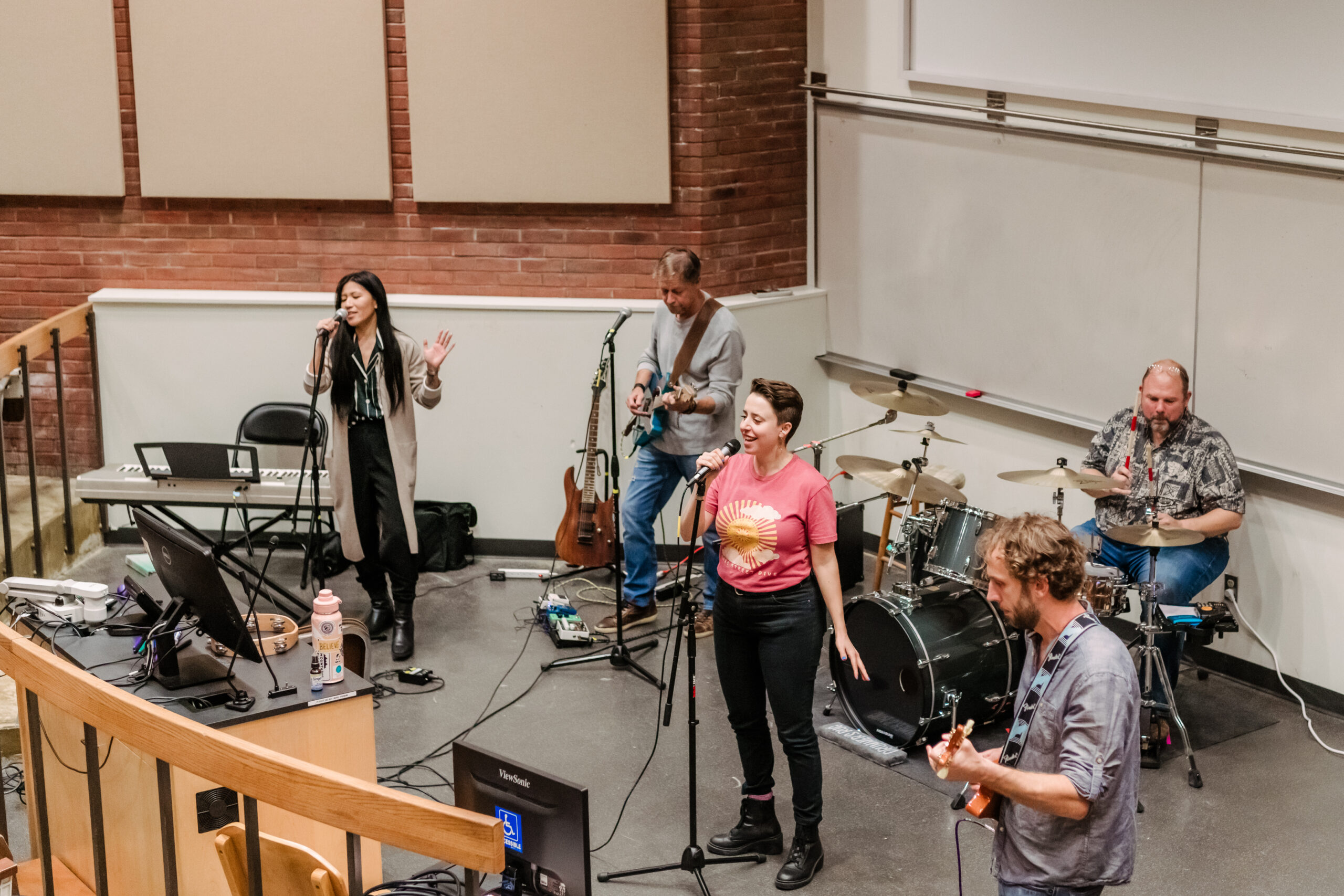Fever dream, a band, practices in a lecture hall