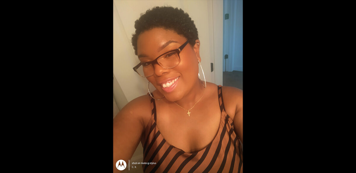 a selfie of a woman in glasses with short brown hair