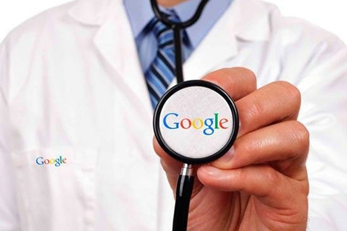 Man in lab coat with "Google" logo holds up a stethoscope, also reading "Google"