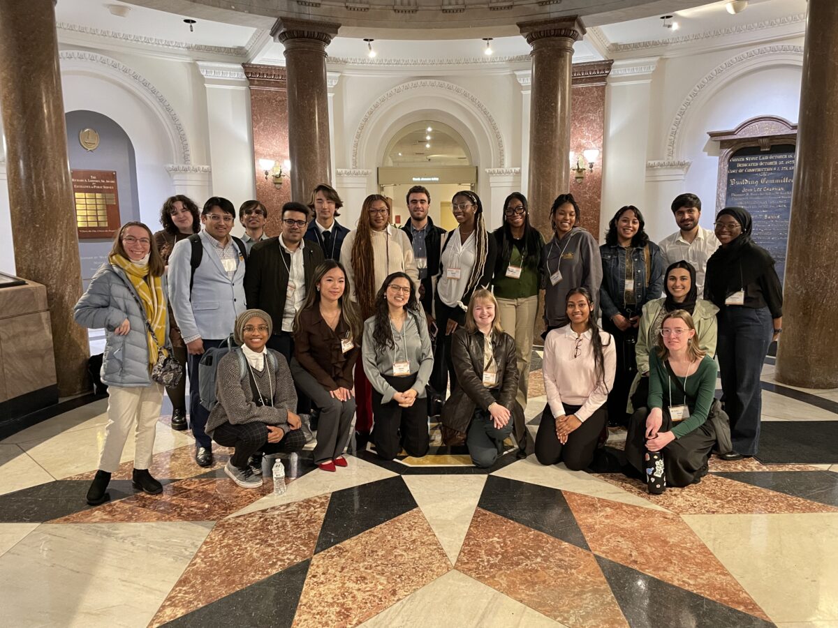 ASB 2025 participants standing inside of Baltimore City hall