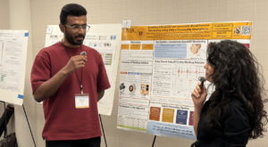 Rishav Gupta at UMBC COEIT Research Day 2026 in front of his poster, "Enabling Affordable and Accessible Blood Pressure Monitoring Using Only a Commodity Smartphone."